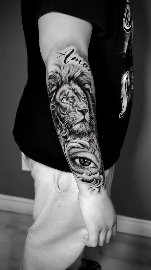 Lion & the eye, a forearm tattoo by Karan Sandhar