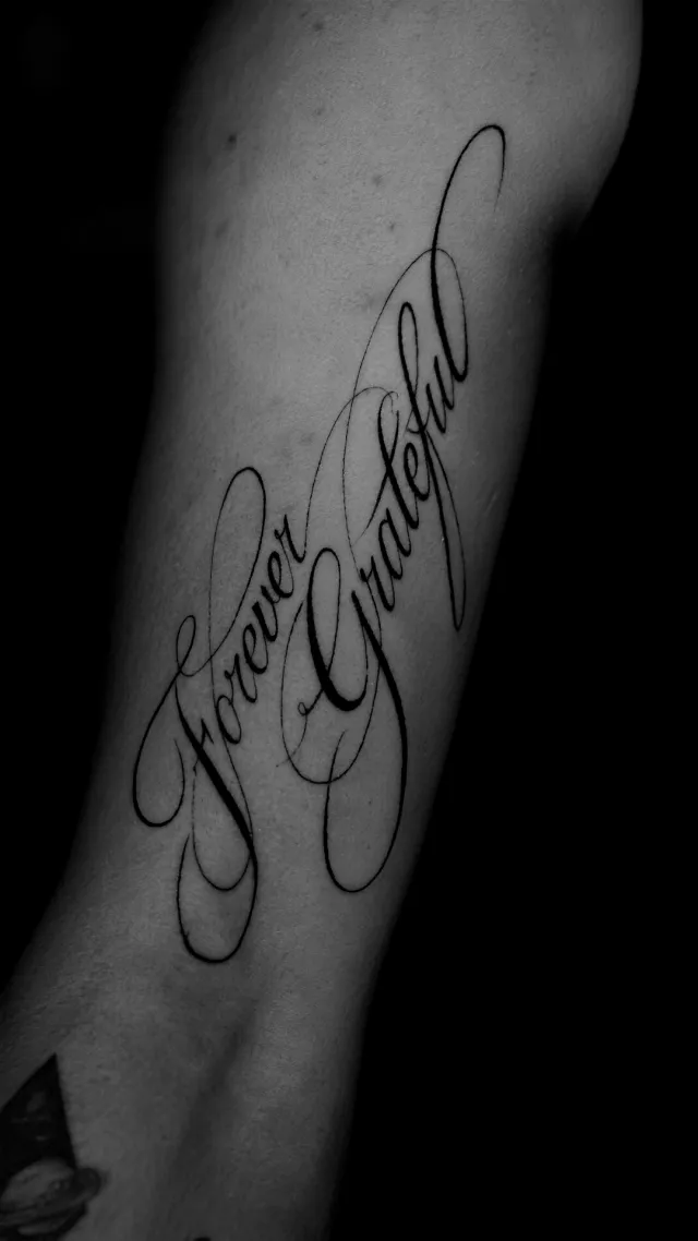 Forever grateful, a upper arm tattoo by Karan Sandhar