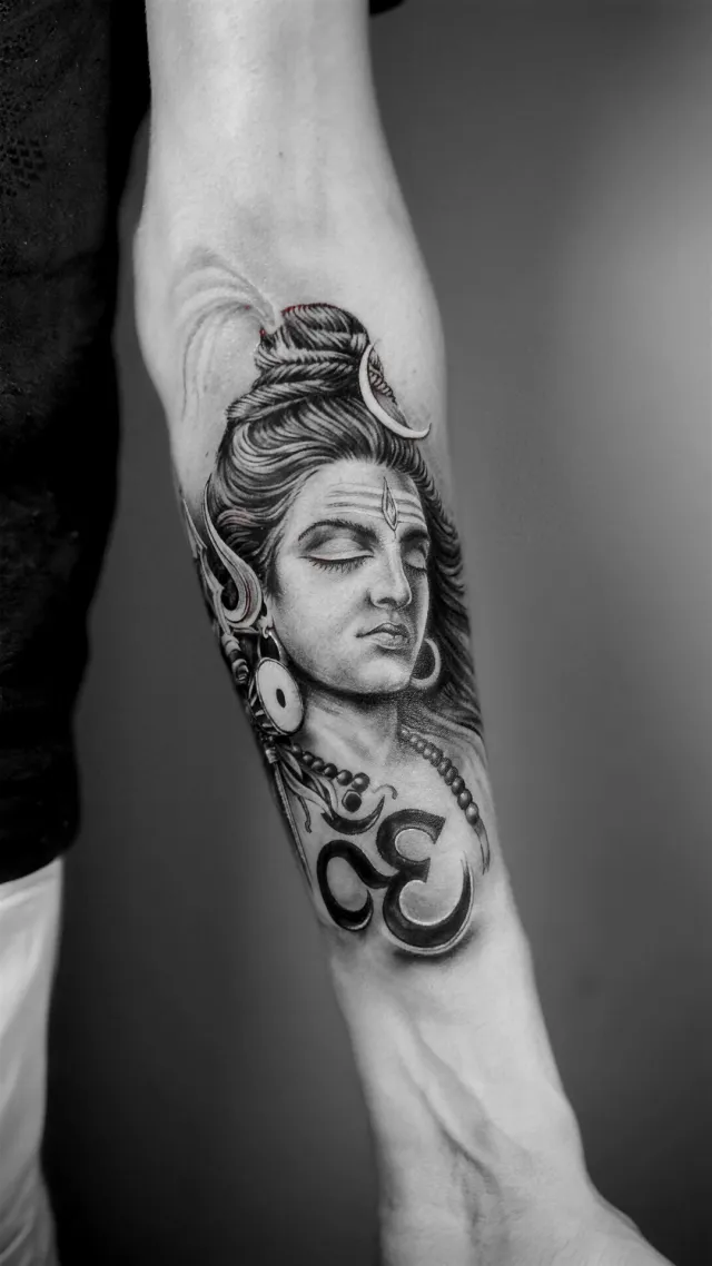 Shiva, a forearm tattoo by Karan Sandhar